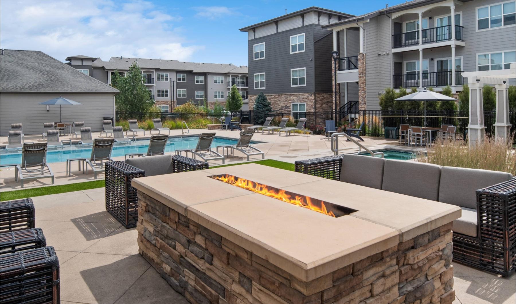 a swimming pool and a firepit