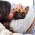 a woman and her pet indoors