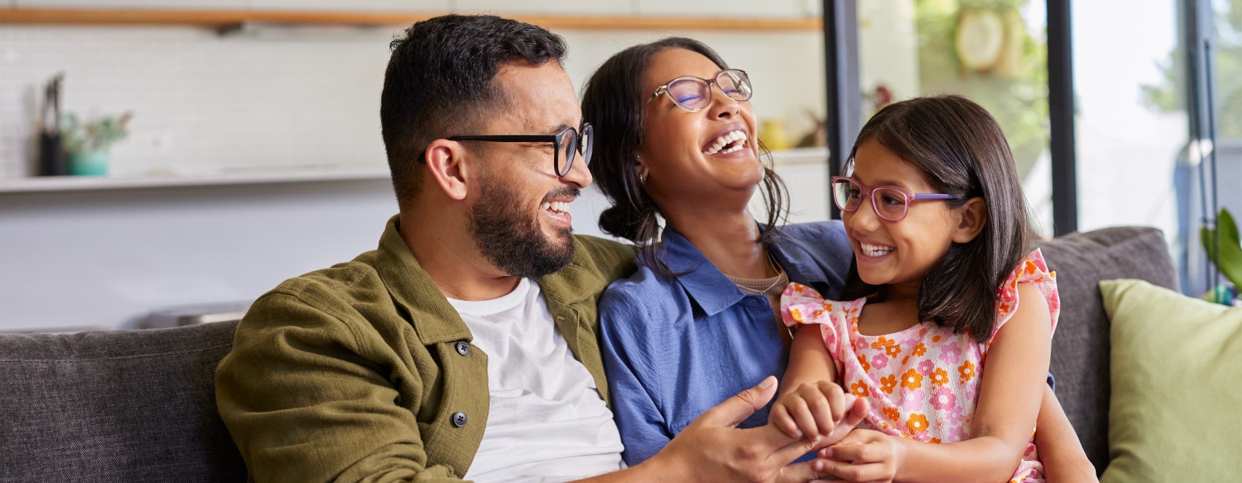 a family in a bright room
