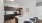 a kitchen with black cabinets