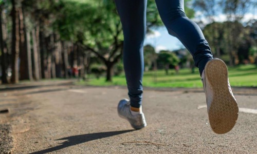 a person running on pavement