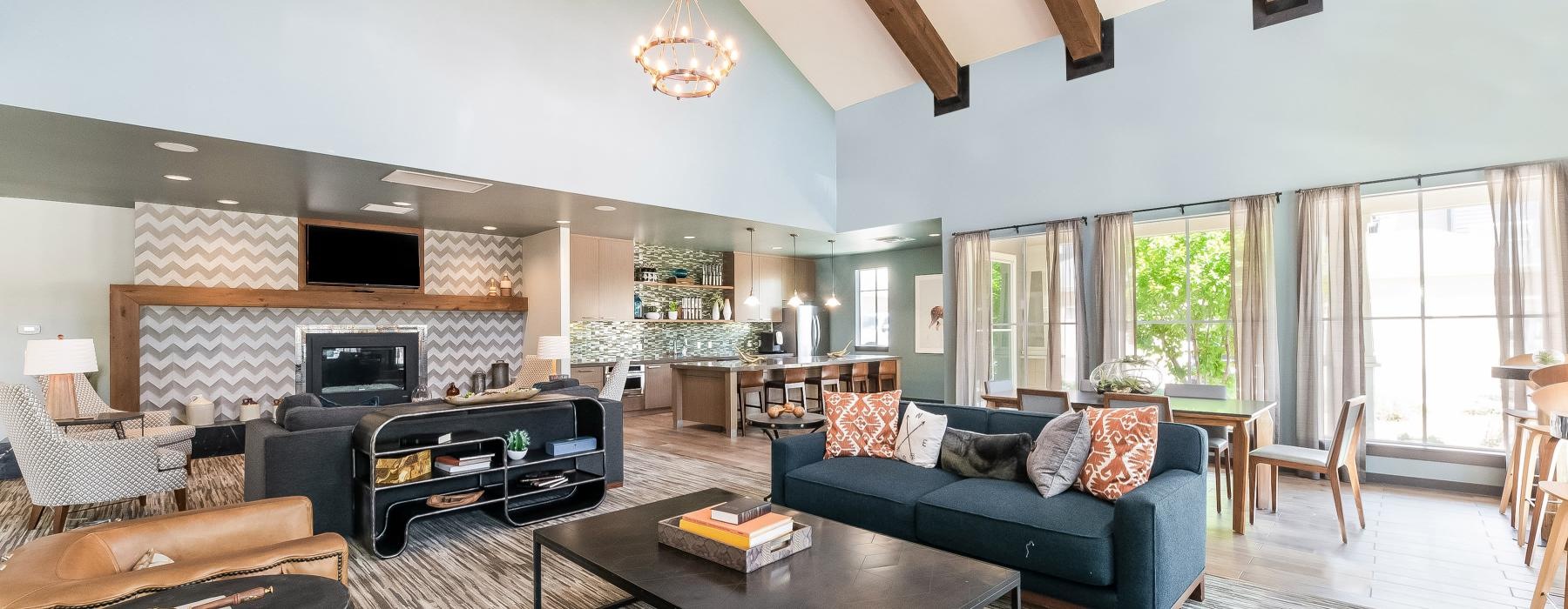 a spacious room with a fireplace